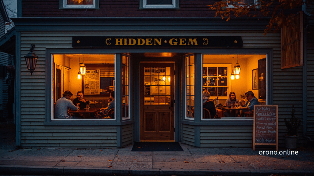 Charming hidden gem Orono Maine restaurant exterior at dusk with warm golden window light and locals dining inside